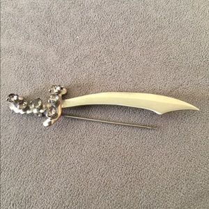 Vintage lapel pin , silver sword